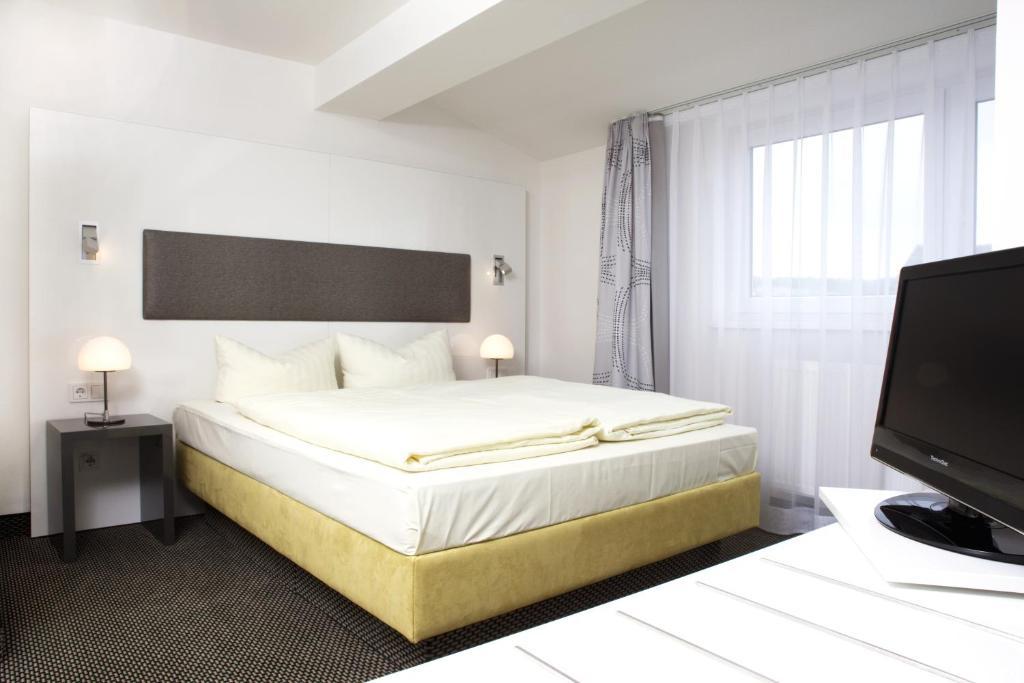 Russmann Hotel & Living Goldbach  Rom bilde